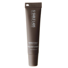 S'ABLE Labs Moringa Lip Salve tube close-up for hydration.
