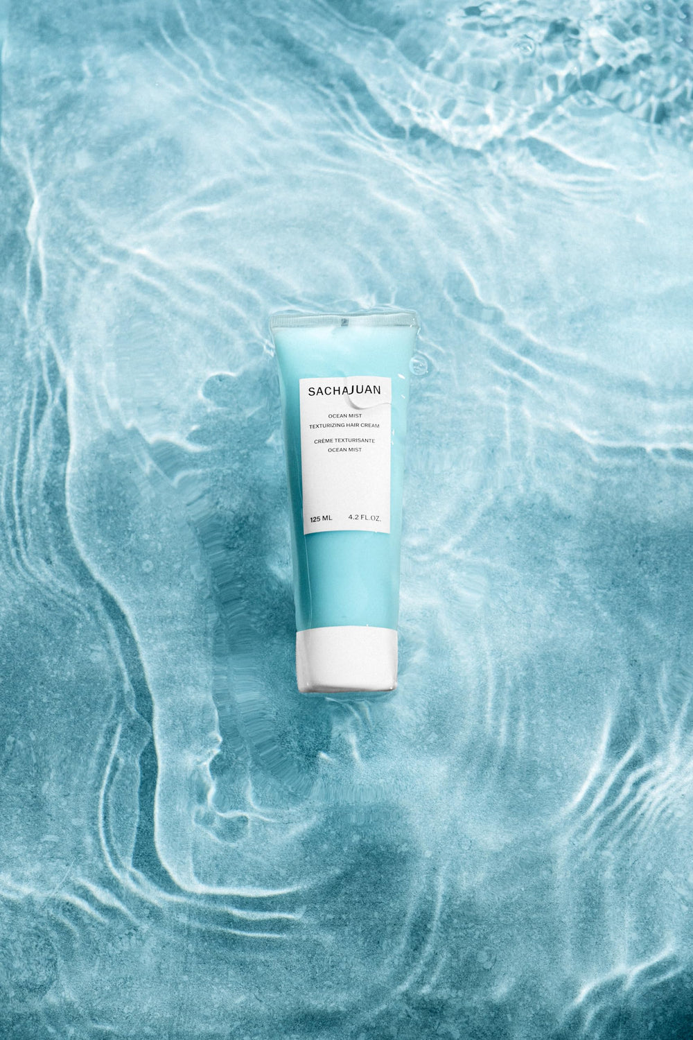 SACHAJUAN Ocean Mist application shows easy styling with salt-water texture.