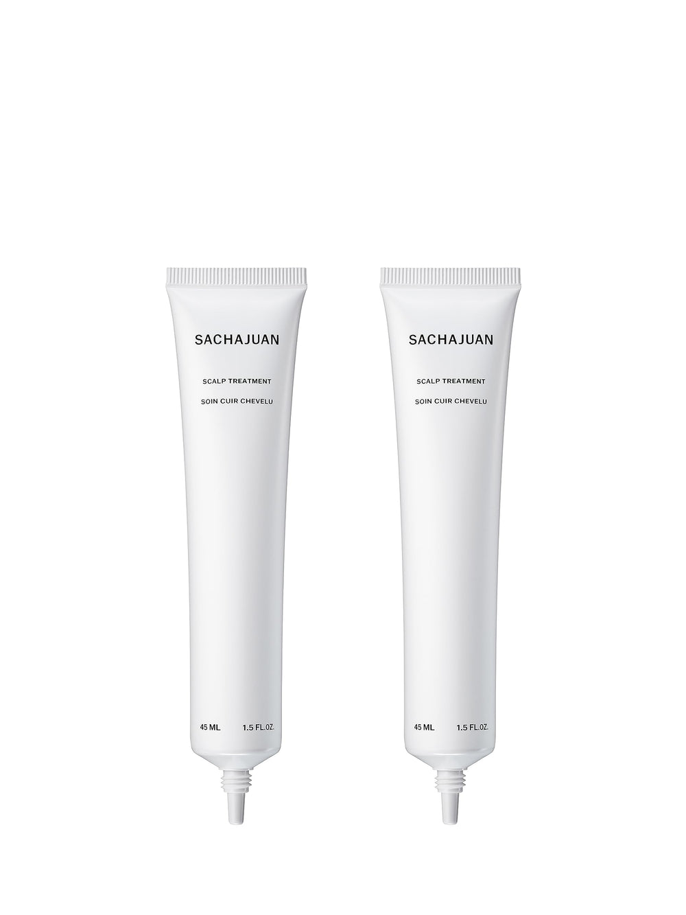 Close-up of SACHAJUAN Scalp Treatment being applied for dandruff relief.
