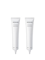 Close-up of SACHAJUAN Scalp Treatment being applied for dandruff relief.
