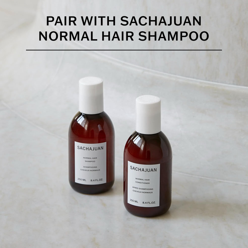 SACHAJUAN conditioner on hair delivering soft shine and bounce in a close-up.