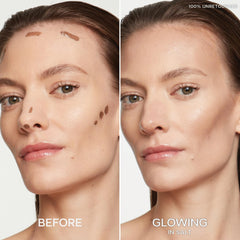 Saie Dew Bronze swirled on cheek for sun-kissed glow.