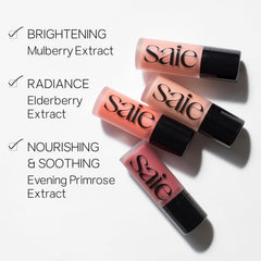 Saie Dew Liquid Blush applied to cheeks for a seamless glow.