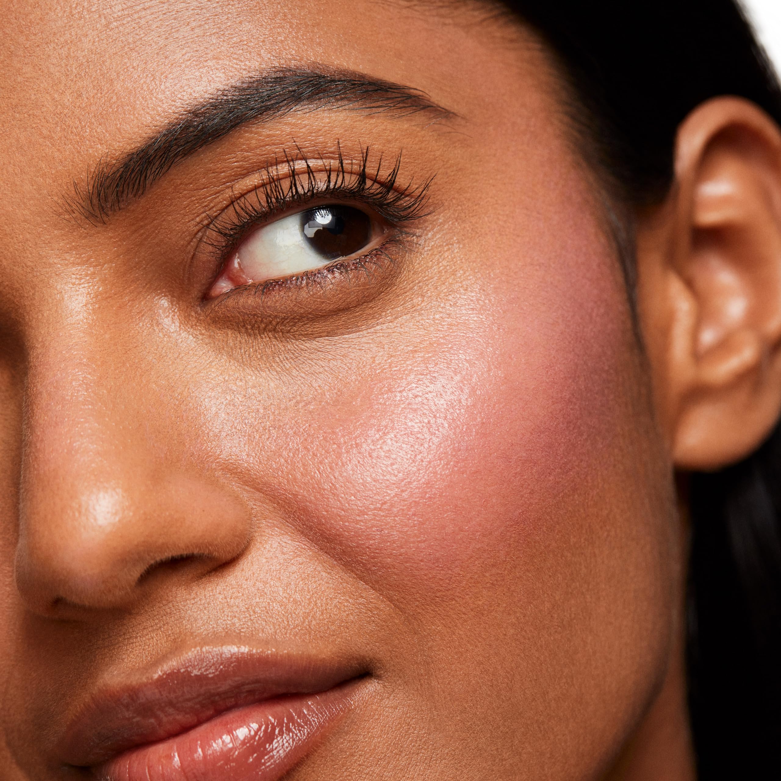 Saie Dew Liquid Blush creamy texture close-up highlighting hydration