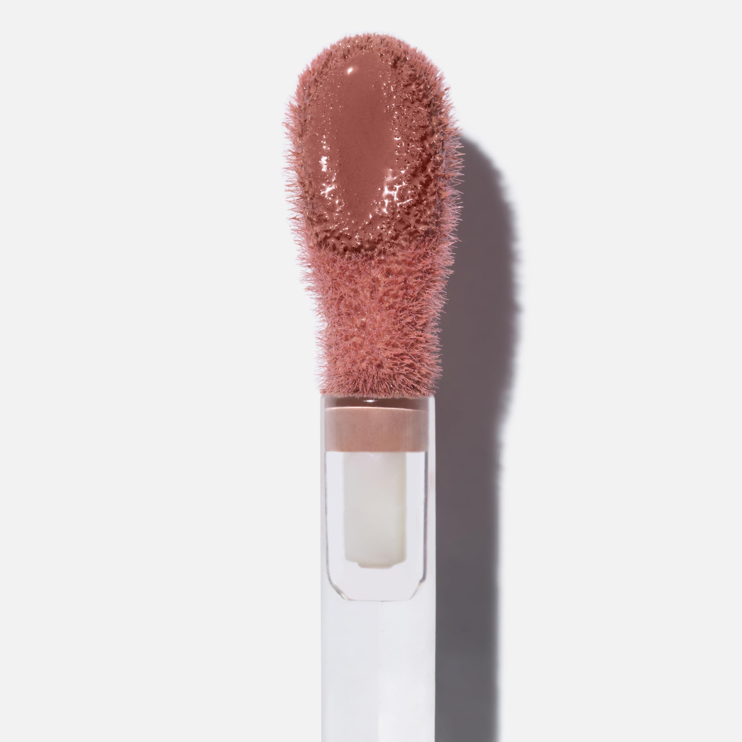 Saie Dew Liquid Blush swatch on cheek for natural glow
