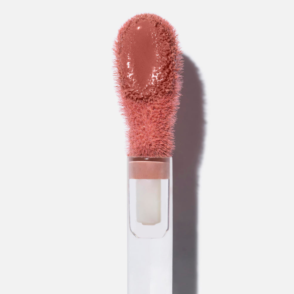 Saie Dew Liquid Blush swatch on cheek for natural glow