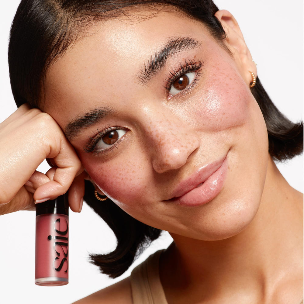 Saie Dew adds a natural flush with buildable intensity.