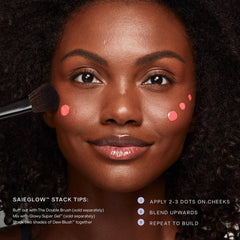 Saie Dew Liquid Blush Spicy Terracotta swatch for warm, dimensional glow.