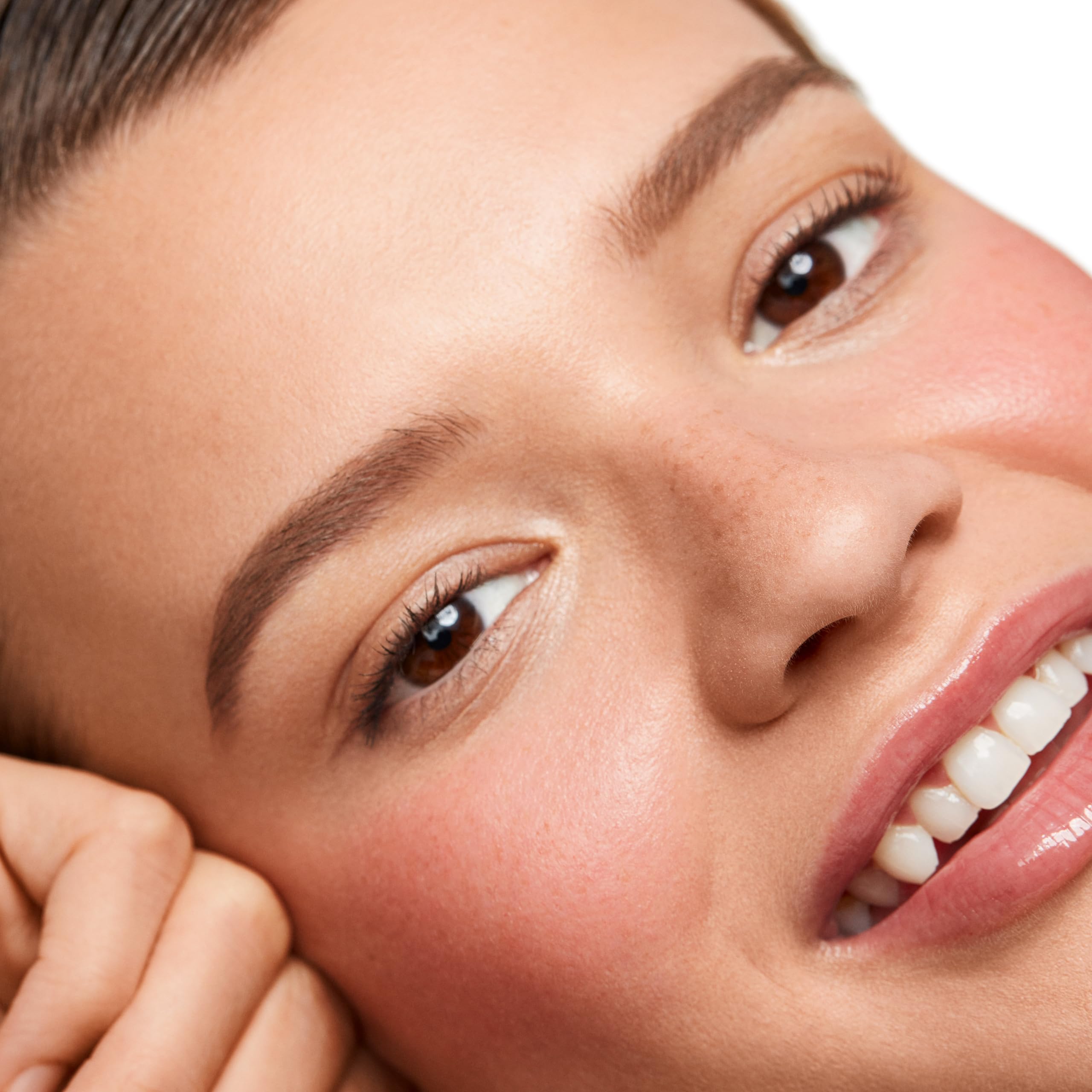 Applied on apples of cheeks for a natural glow with Saie Dew Blush.