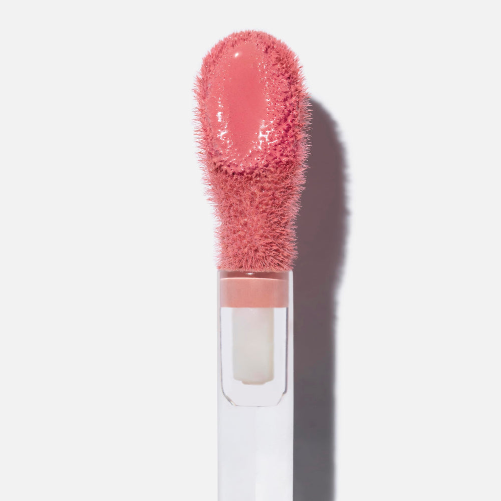 Creamy texture of Saie Dew Liquid Blush blends seamlessly into skin.
