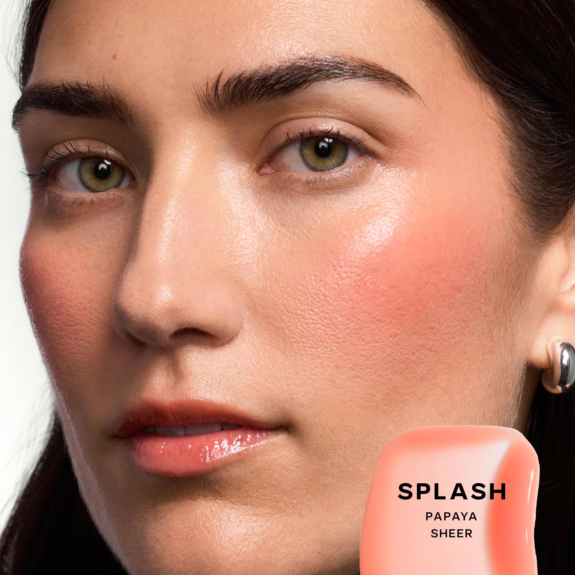 Saie Glossybounce tinted lip oil application for sheer color and cushion