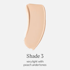 Saie Glowy Super Skin Tint shade 3 swatch on skin shows peach undertones