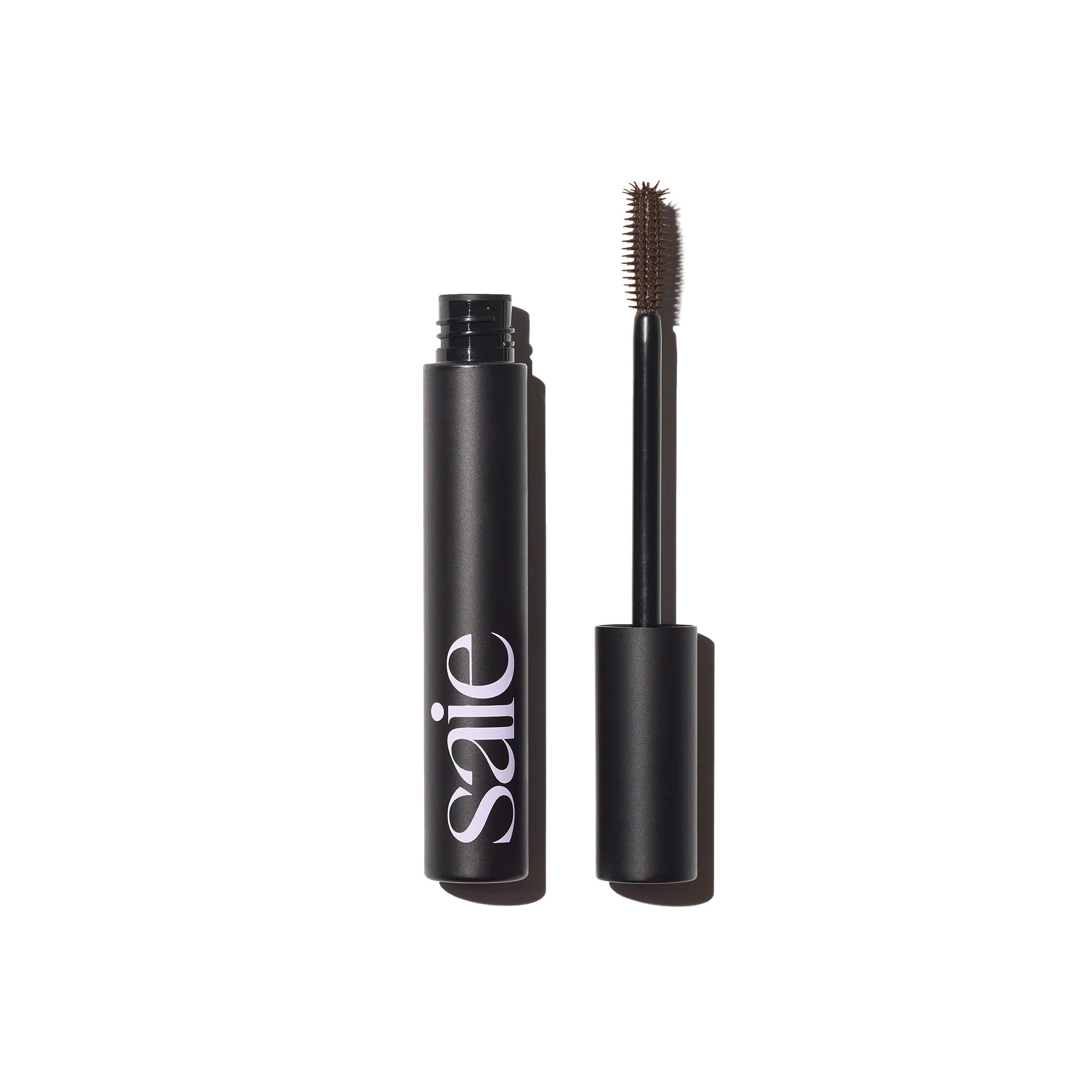 Saie Mascara 101 brown bottle cap close-up showing conditioning formula and rich pigment.