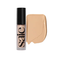 Saie Slip Tint radiant concealer application demonstrates lightweight coverage for a natural look.