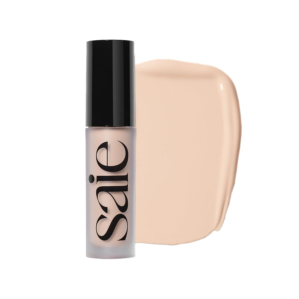 Saie Slip Tint concealer tube close-up showing lightweight, radiant coverage for the skin
