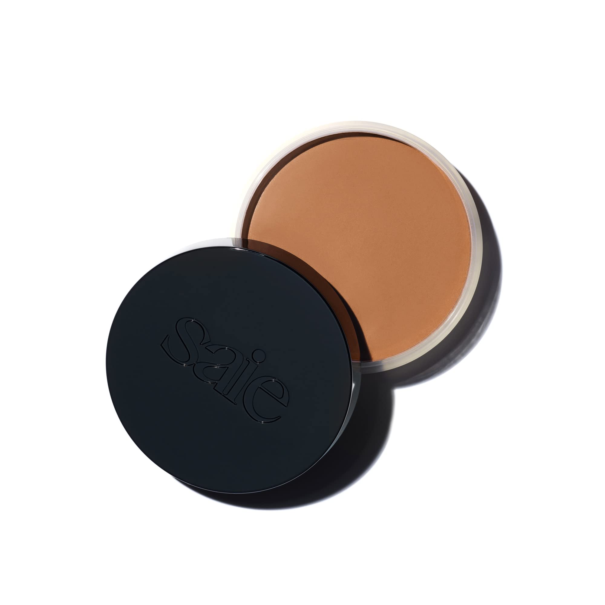 Saie Sun Melt bronzer jar showing a lightweight formula with a natural finish