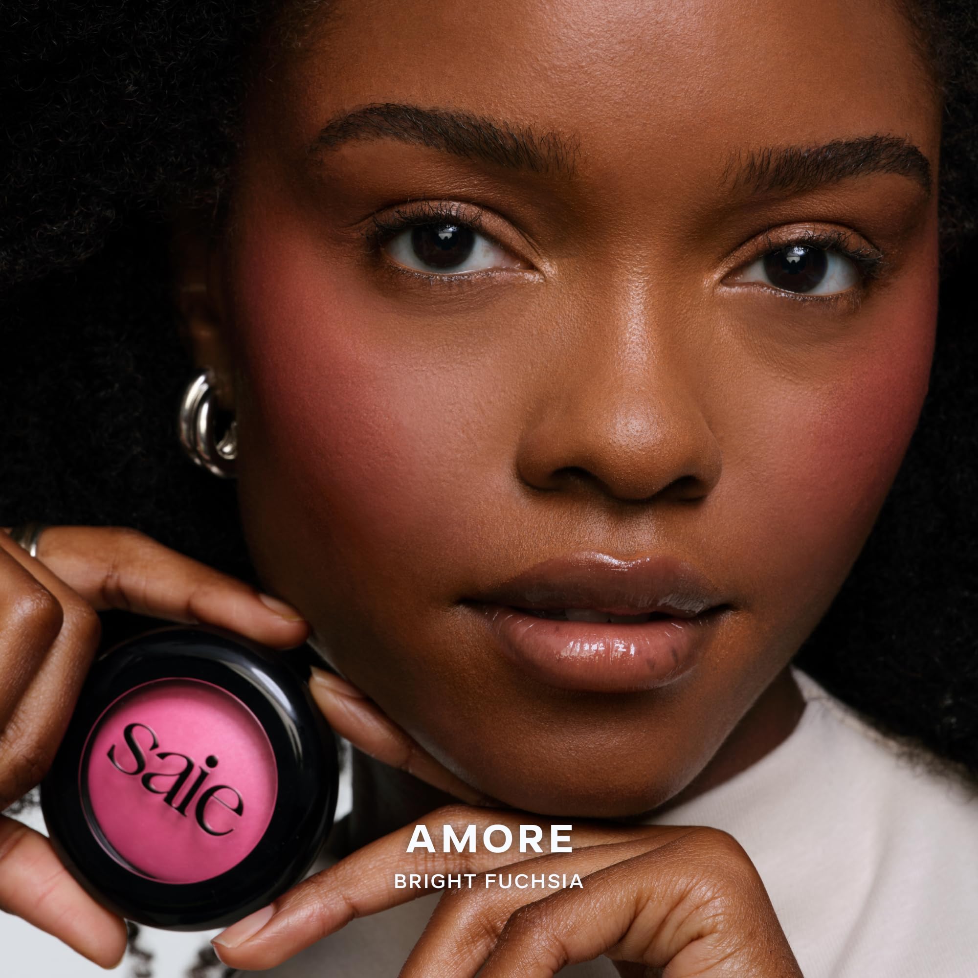 Velvety texture of Saie SuperSuede blush application.