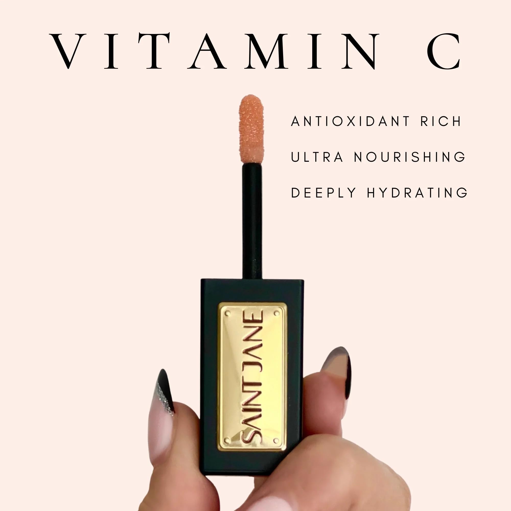 SAINT JANE Nectar lip oil being applied for a smooth glide
