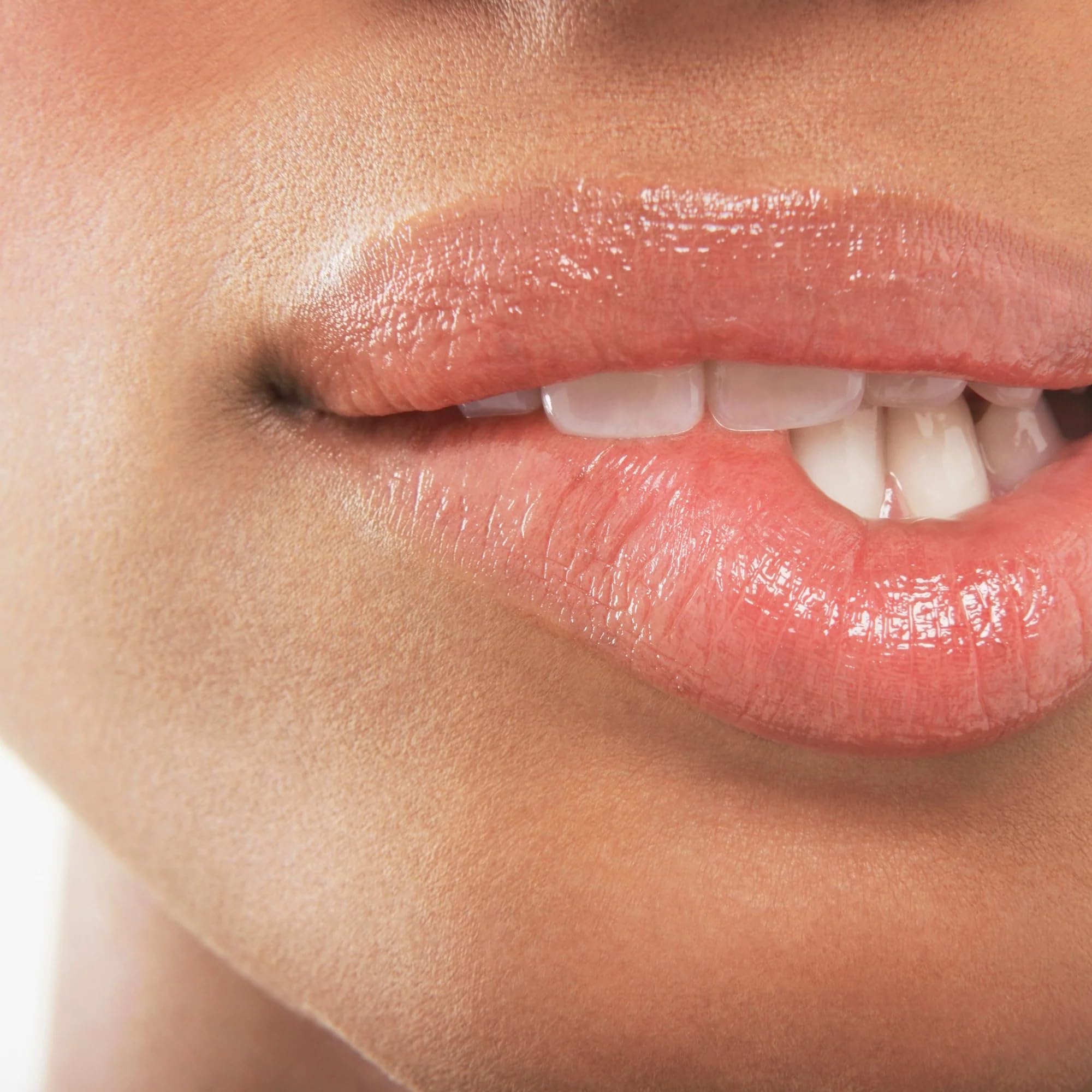 SAINT JANE Nectar lip oil on glossy lips after application