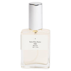 Saint Rita Parlor Rita's Parfum bottle close-up highlighting vanilla musk and leather notes.