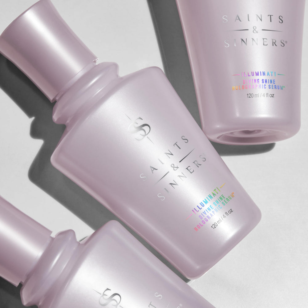 Bottle reflecting light to show holographic shine on hair