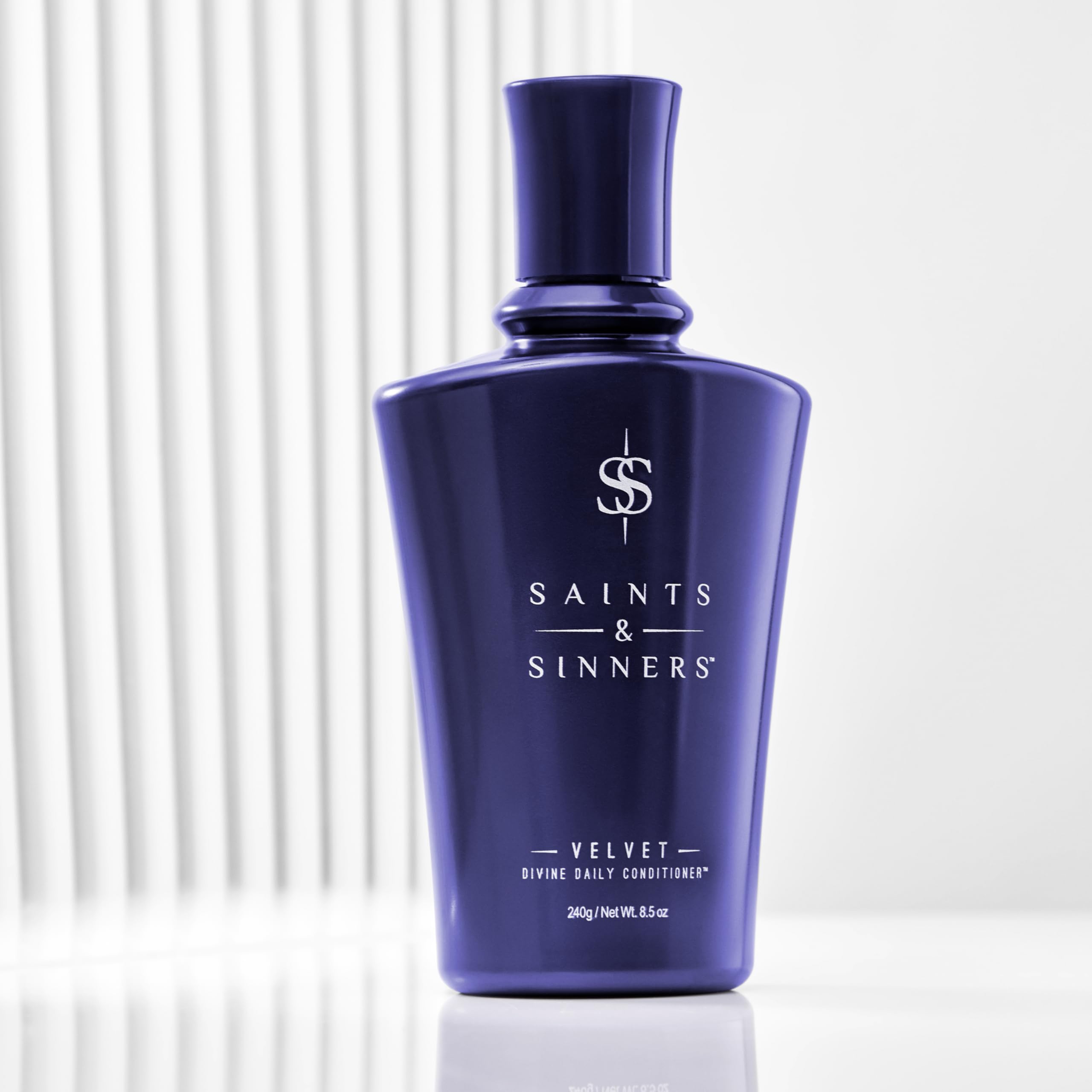 Creamy Velvet Divine texture spreads smoothly through hair.