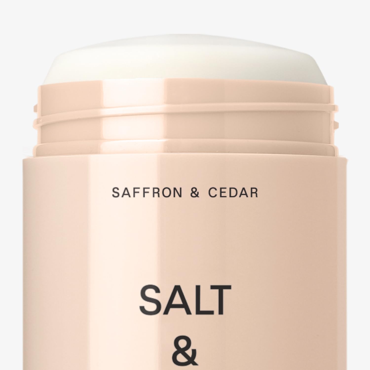 Salt & Stone packaging highlights saffron cedar fragrance.