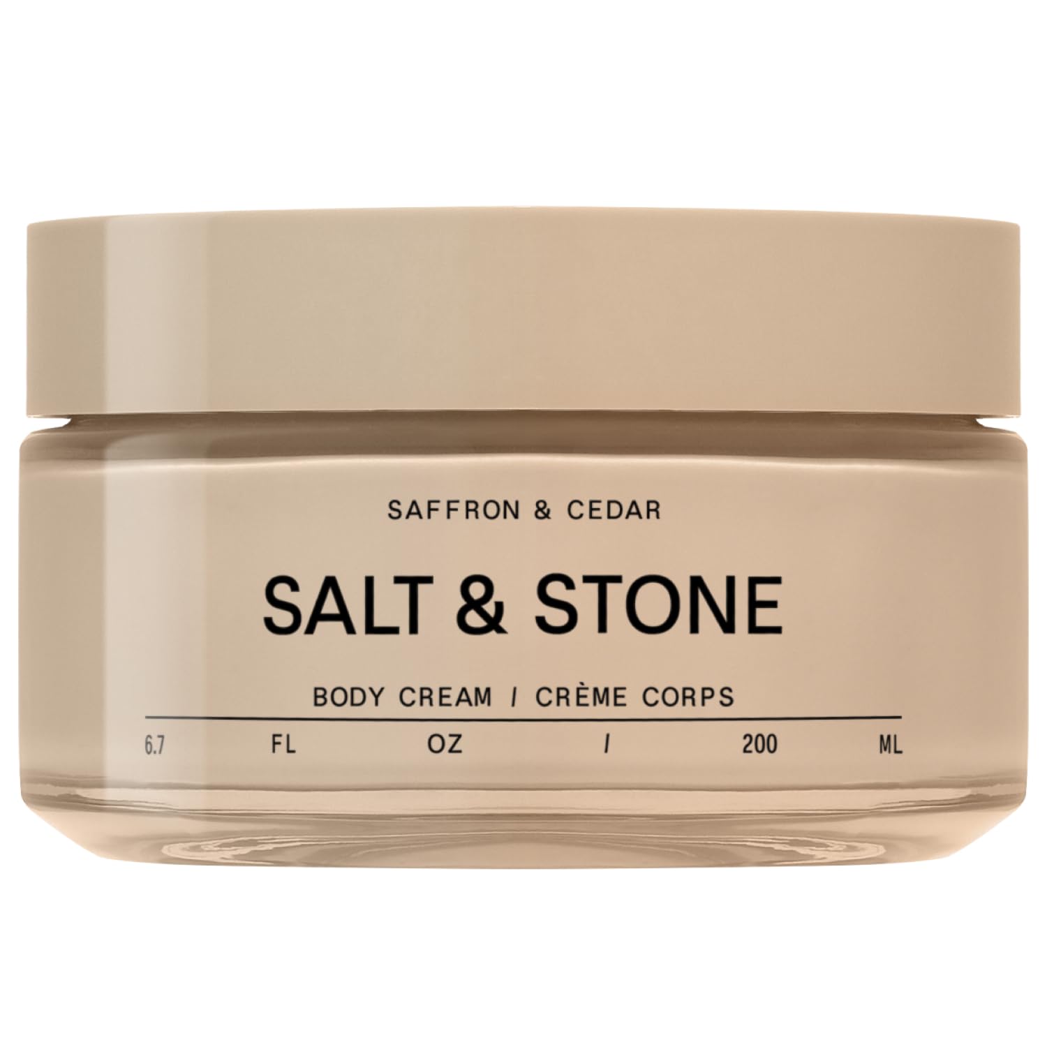 Salt and Stone saffron-cedar bottle showcases a luxurious body cream with lasting hydration.