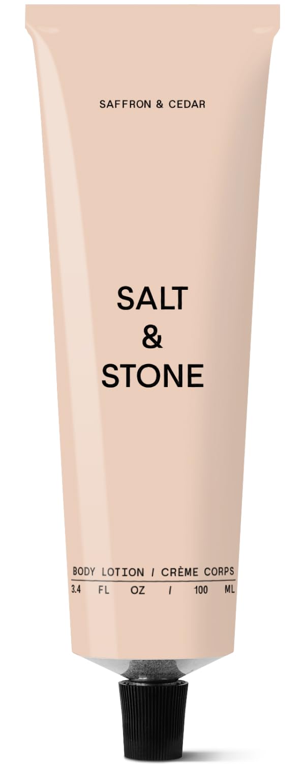 Salt & Stone body lotion bottle with saffron cedar scent and hydrating feel.