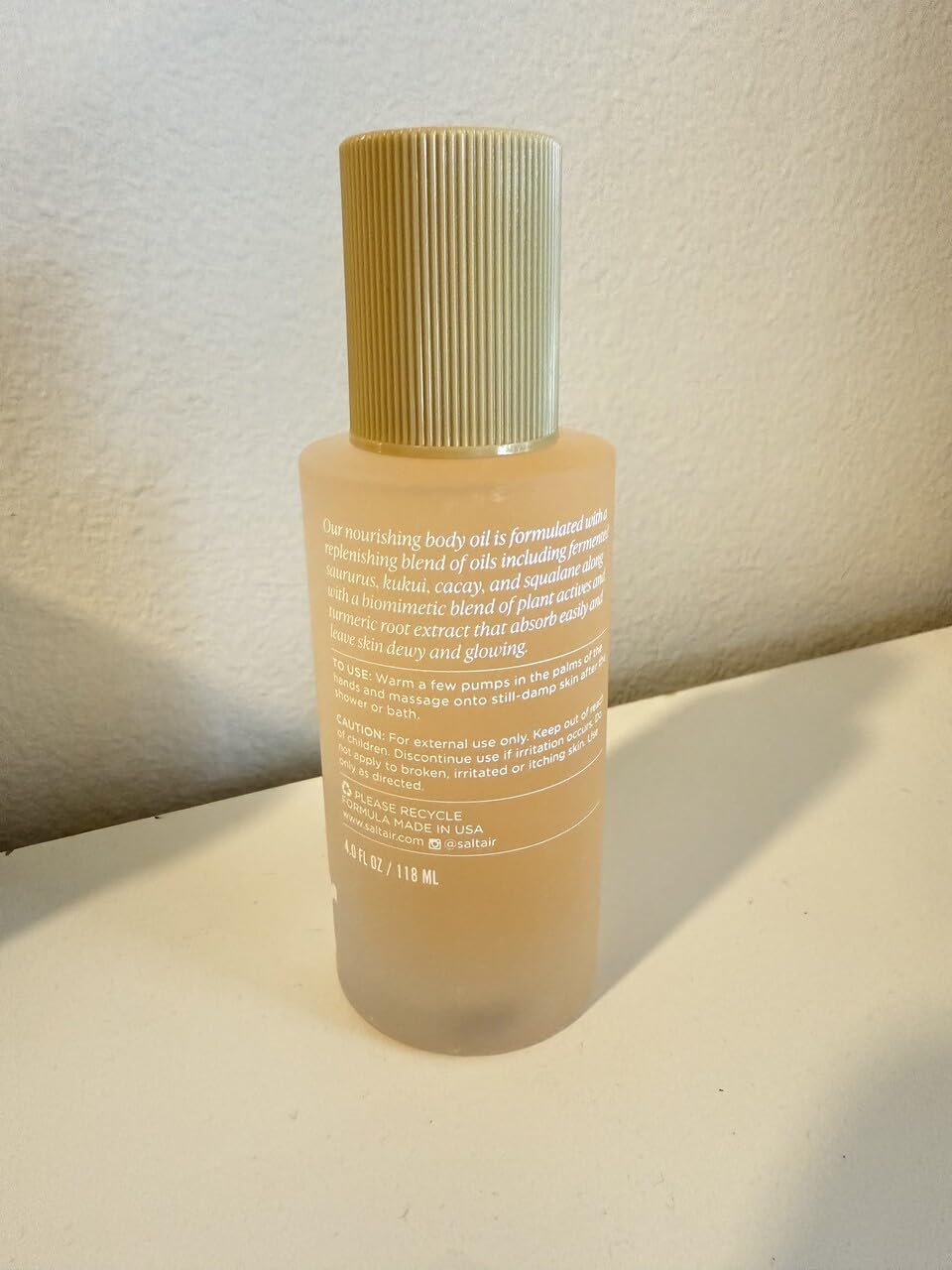 Saltair huile corporelle parfum heure dorée: expérience sensorielle tropicale après la douche.
