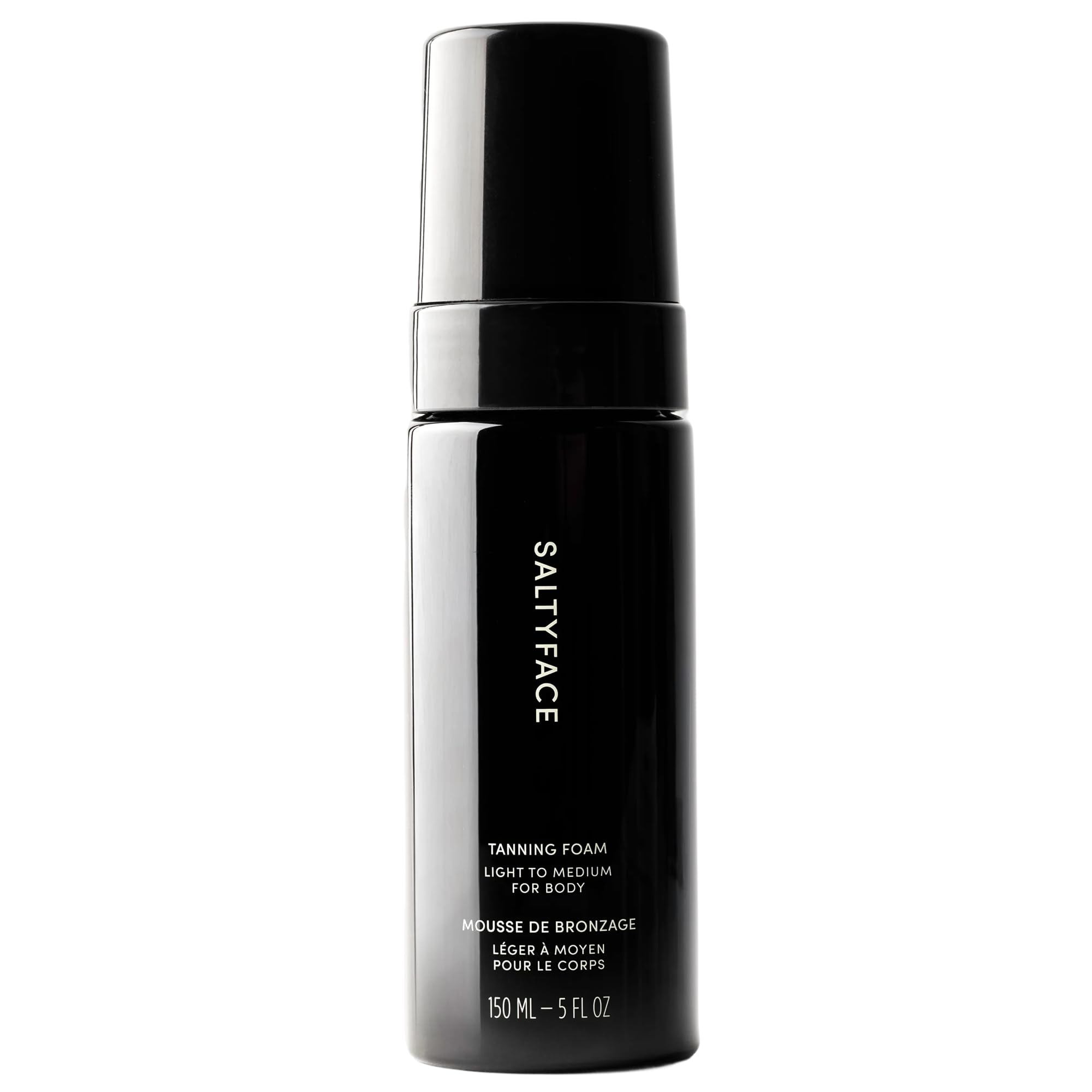 SALTYFACE Tanning Foam bottle demonstrates easy, streak-free application for a sun-kissed glow.