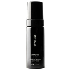 SALTYFACE tanning foam bottle for easy full-body self-tanning.