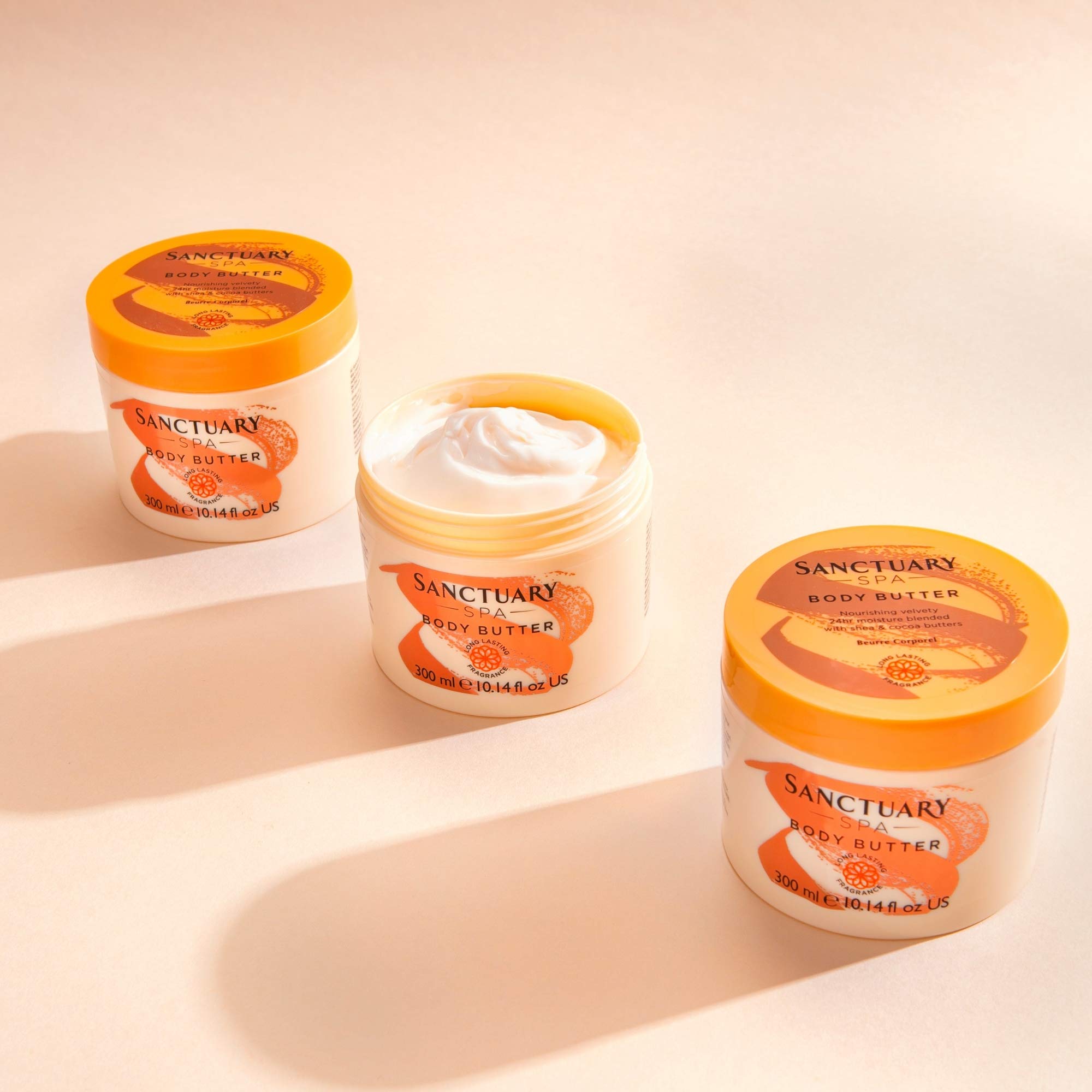 SANCTUARY Spa Body Butter container on shelf indicating daily pampering.