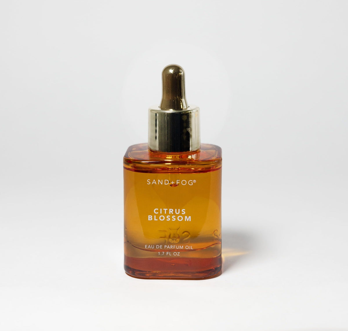 Sand + Fog Citrus Blossom bottle dropper for precise, personal fragrance application.