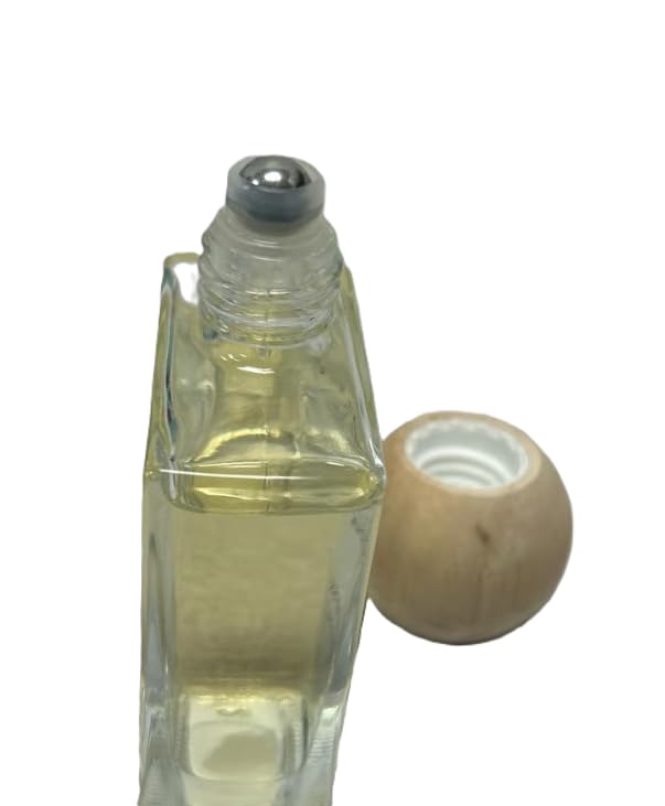 Sand + Fog Vanilla Musk roll-on applicator for precise on-the-go fragrance