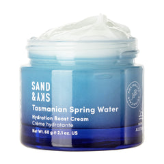 Sand & Sky moisturizer bottle delivering Tasmanian Spring Water hydration for dry skin.