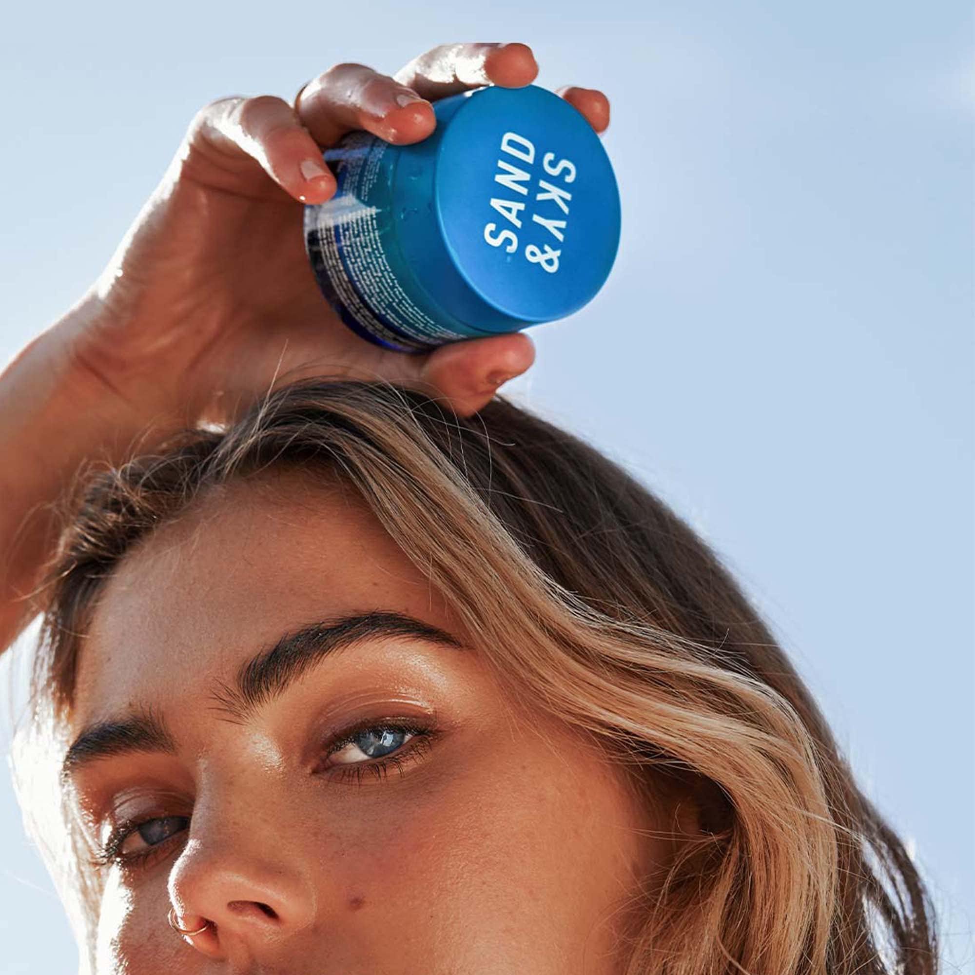Sand & Sky vegan cruelty-free logo on packaging.