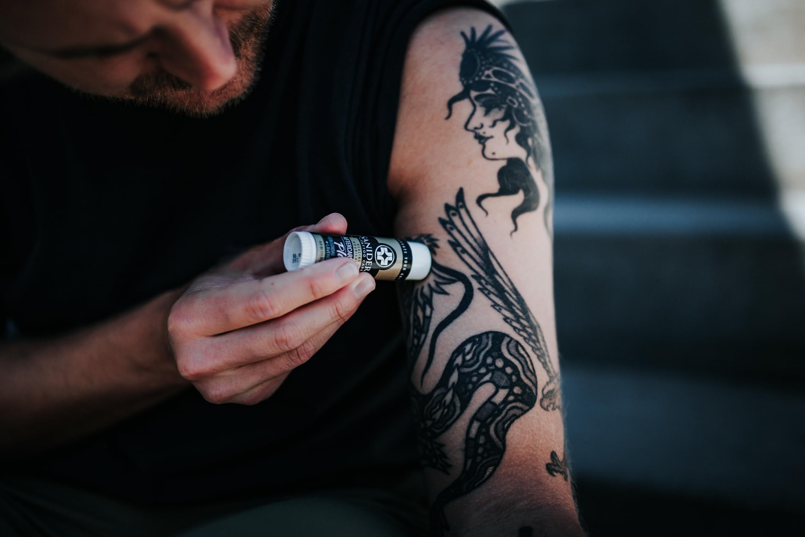 Vibrant tattoo skin maintained with Saniderm Balm Plus moisture balance.