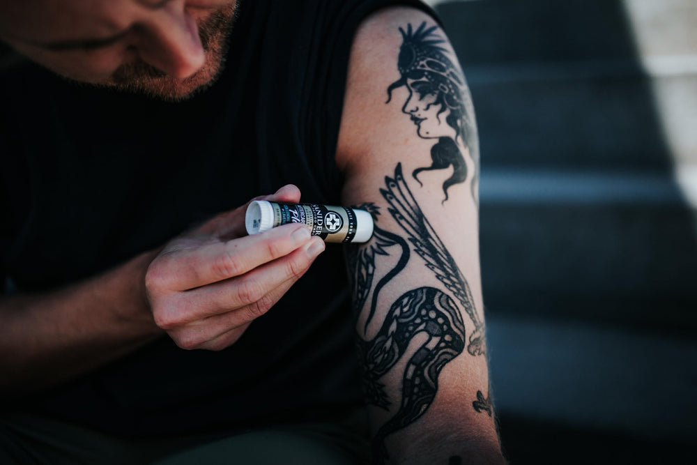 Vibrant tattoo skin maintained with Saniderm Balm Plus moisture balance.