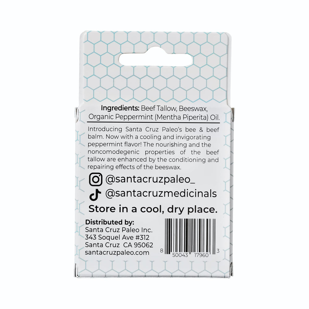 Santa Cruz Paleo lip balm stick close-up shows smooth texture for lasting moisture.