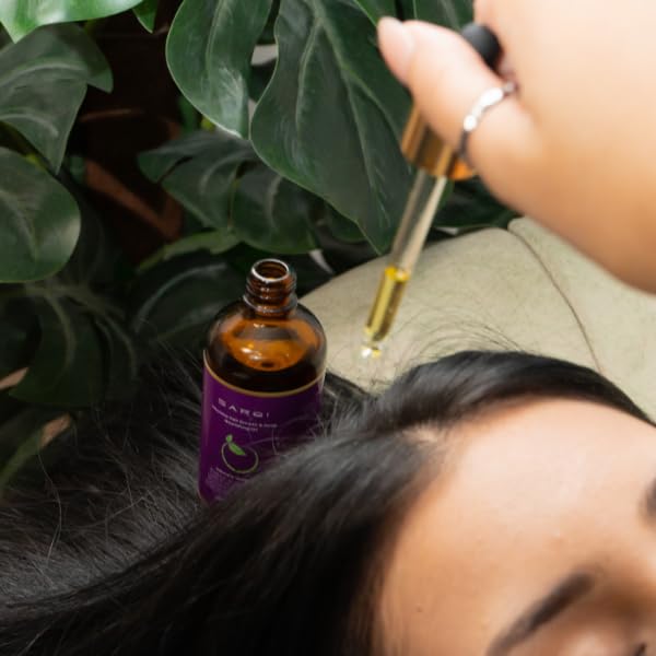 SARQI Hair Growth Oil on hair shows improved fullness and manageability