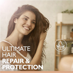 Saryna Key Repair Oil applied on towel-dried hair for conditioning