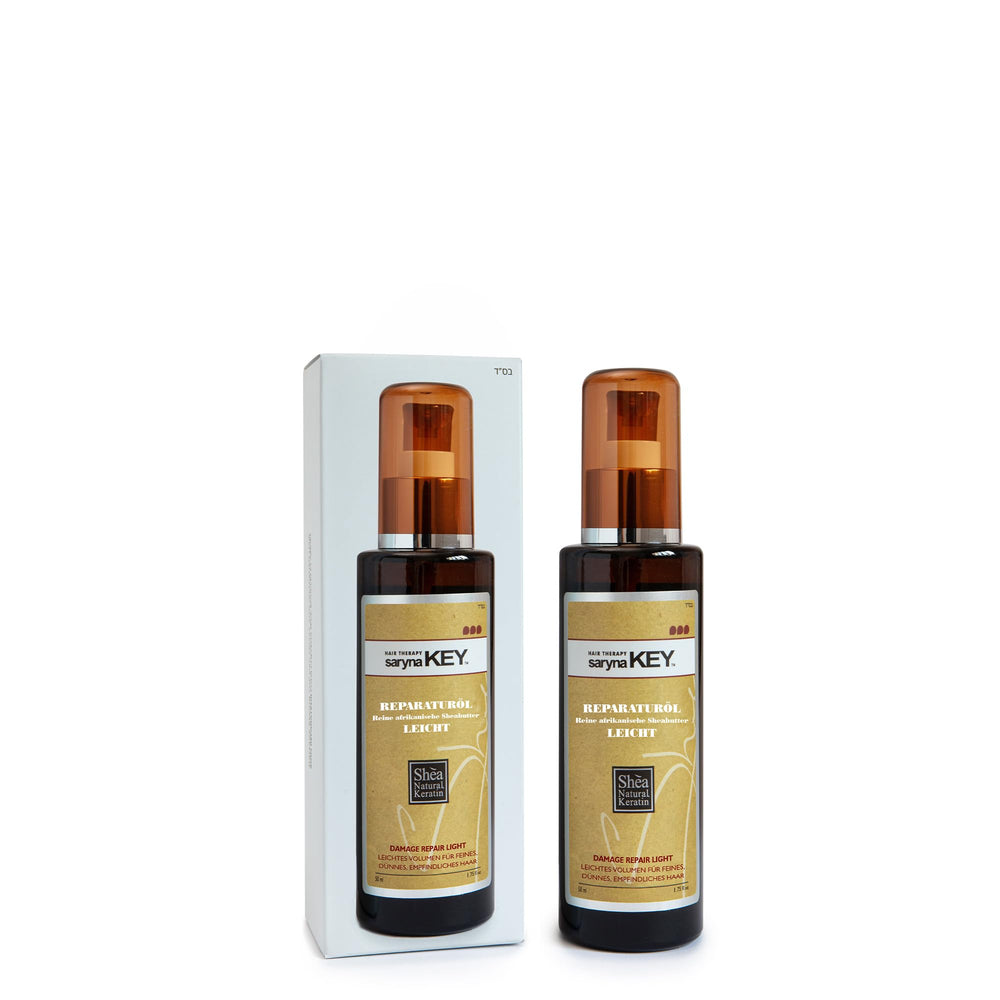 Saryna Key Repair Oil bottle pour showing easy frizz-control application