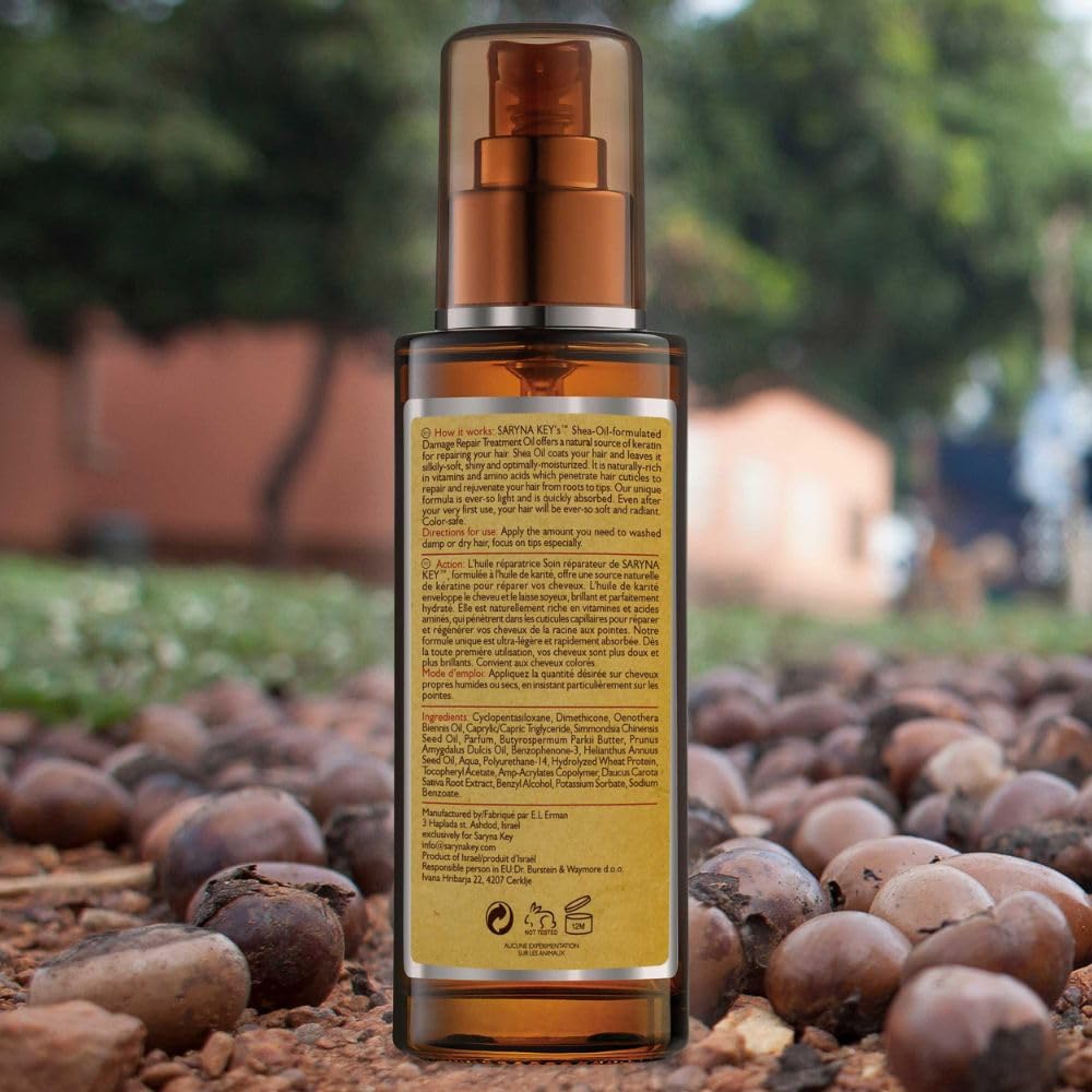 Saryna Key Repair Oil on towel-dried hair for deep conditioning.