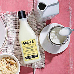 SAUCE BEAUTY detangling action smooths curls with lightweight hydration.