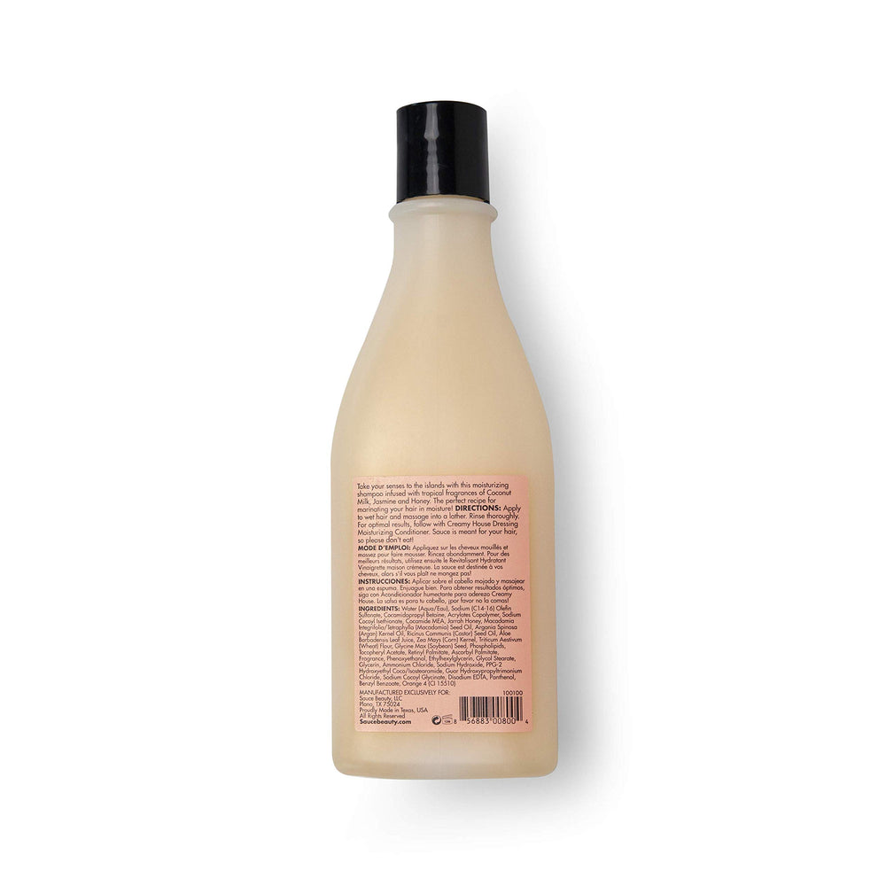 SAUCE BEAUTY Island Marinade Shampoo bottle on shelf suggests color-safe cleansing.