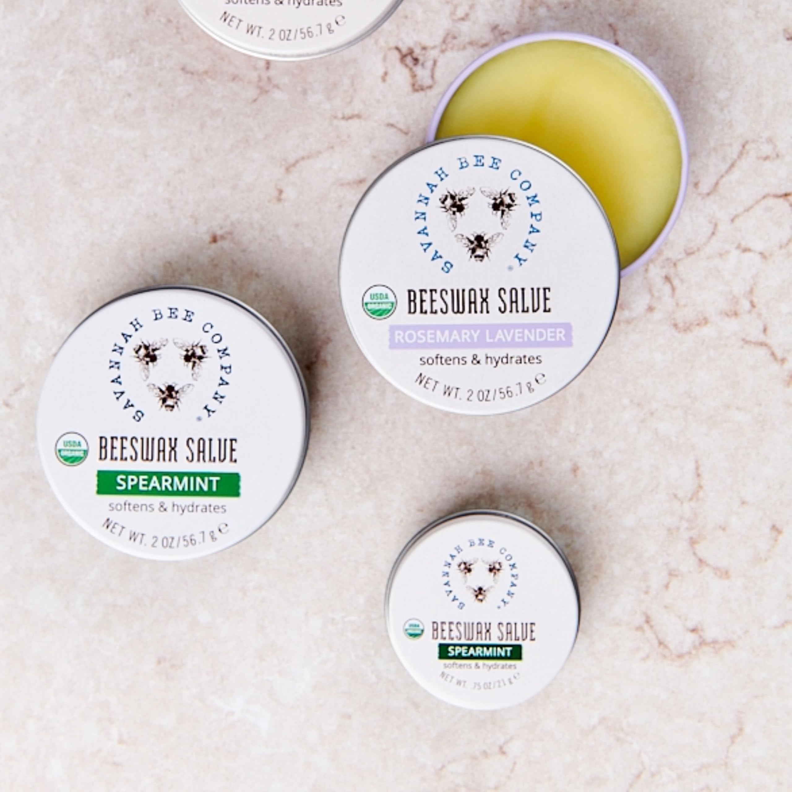 Applying Savannah Bee salve on hands to soften dry skin.