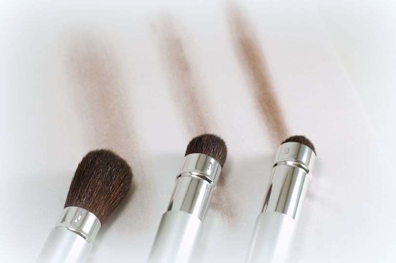 Saving Grace Hair Powder Black swatches demonstrate blendable shade for a natural look