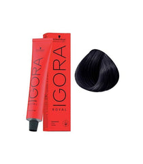 Igora Royal blue-black color applied to porous hair for even results.