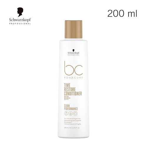 Schwarzkopf Professional BC Bonacure Q10+ Time Restore conditioner being dispensed for easy application.